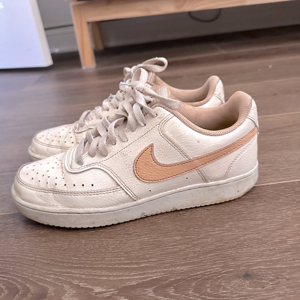 Pink and white Nikes